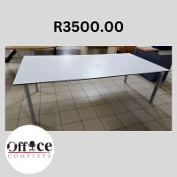 D16 - Boardroom table 8 x seater white size 2.4 x 1.2 R3500.00